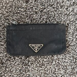 Prada coin person